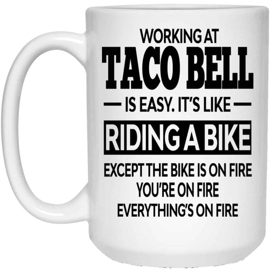 
	Working At Taco Bell Is Easy It’s Like Riding A Bike Mug